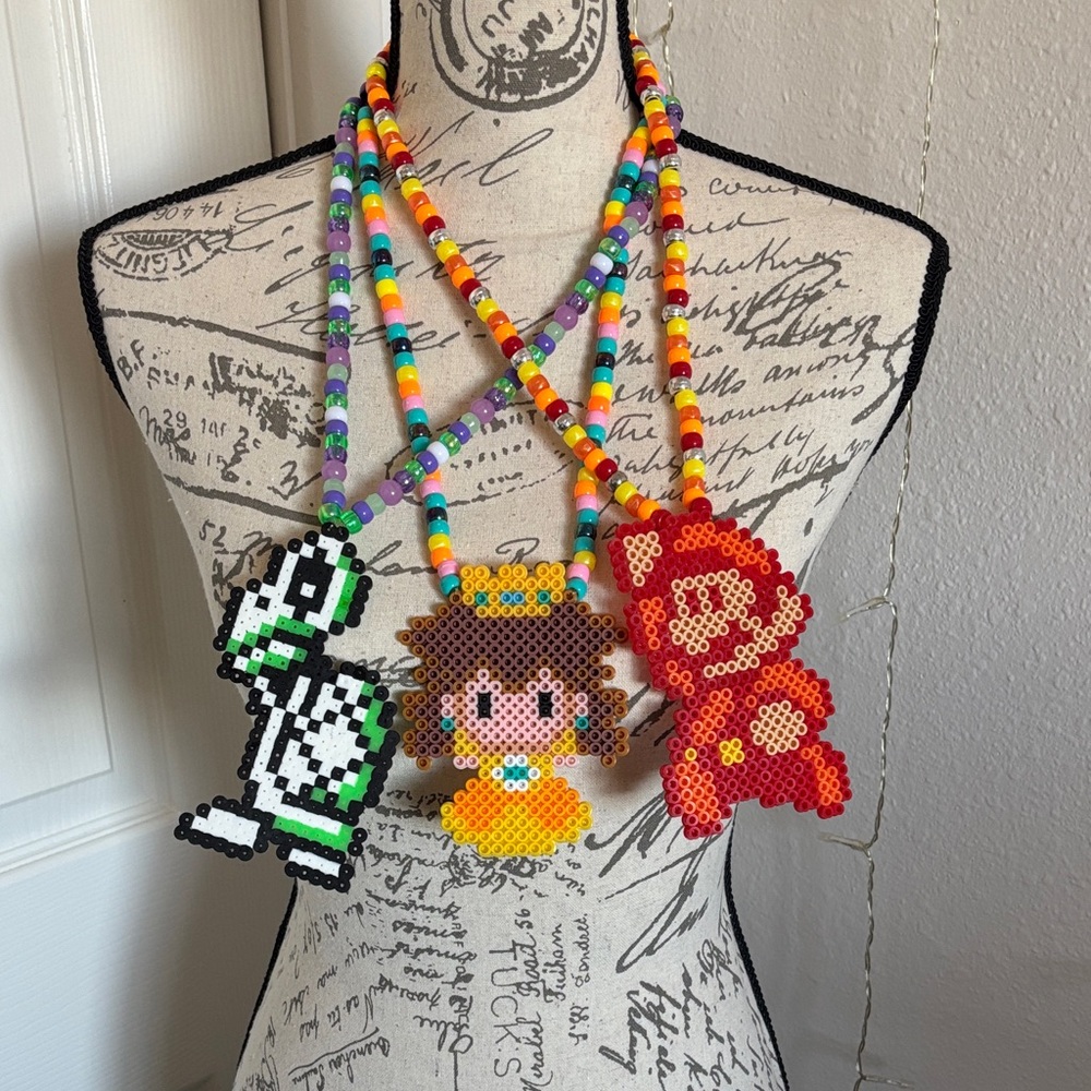 Nintendo GlowāinātheāDark Beaded Rave Necklace Set ā 3āPiece MultiāColor Gaming